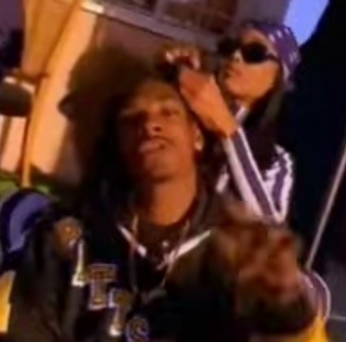 Snoop Doggy Dogg getting his hair braided