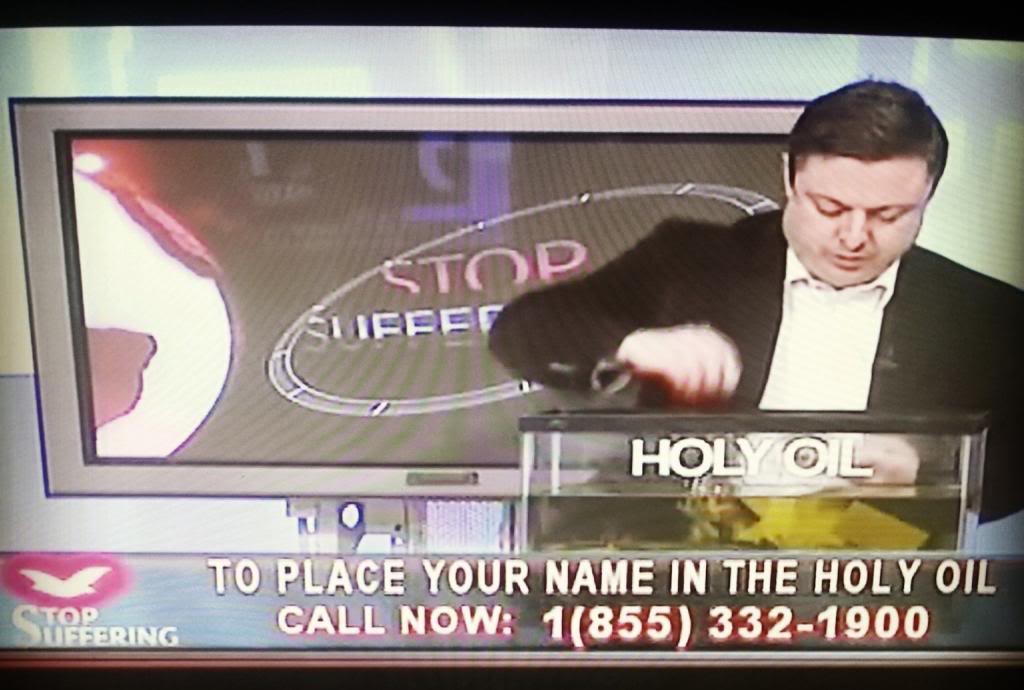 Pastor putting names in Holy Oil